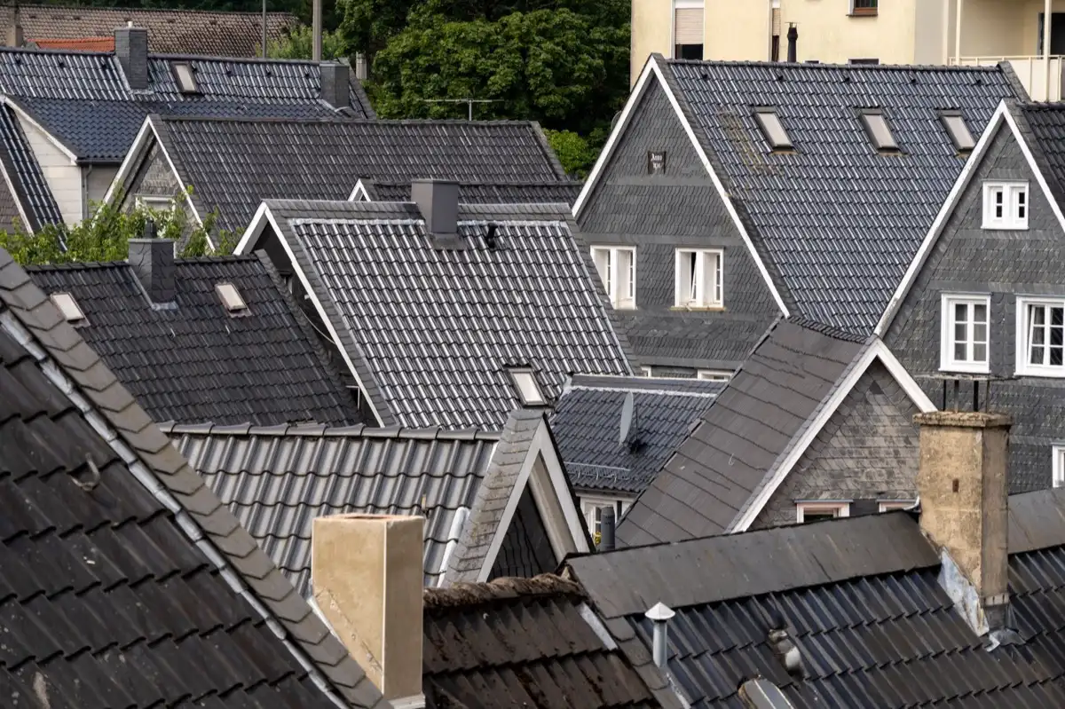 Steep roof eaves and gutter lines on houses in Pomona, CA