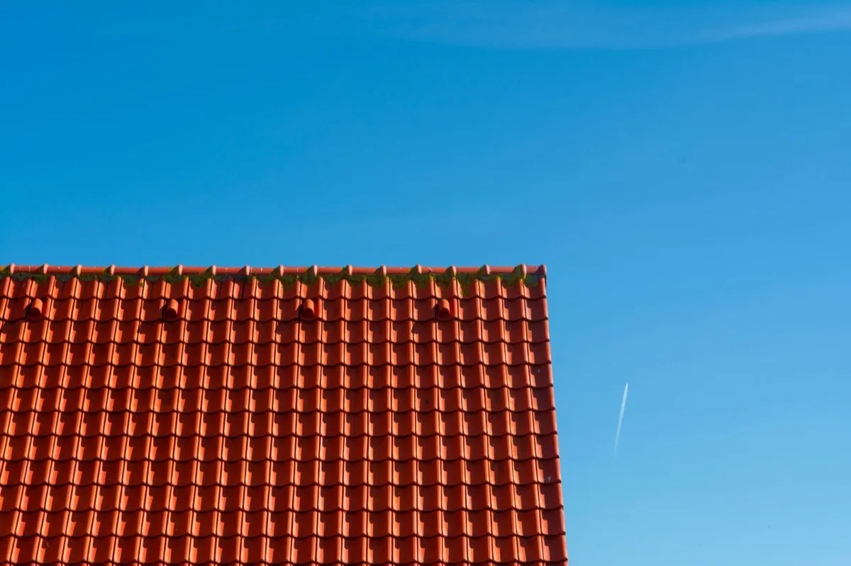 Tile roof gable in full sun, the kind of exposure that sets roof life in Pomona, CA